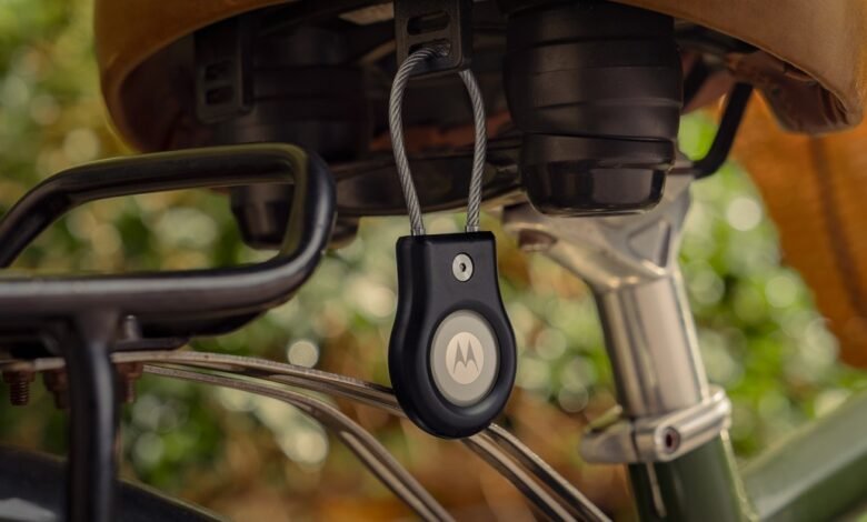 Motorola tracker attached to bicycle seat with cable lock.