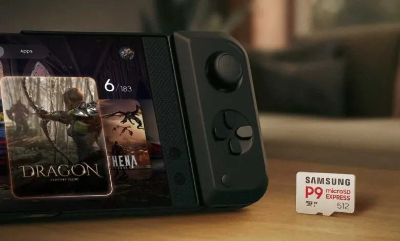 Handheld gaming console displaying game library with Samsung P9 microSD card.
