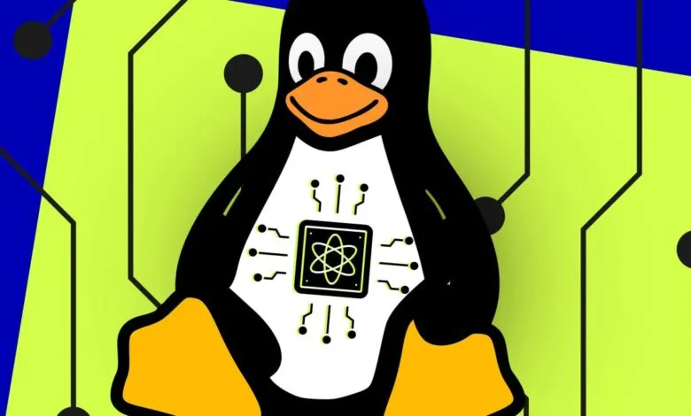 Tux penguin with a glowing atom chip on a circuit board background.