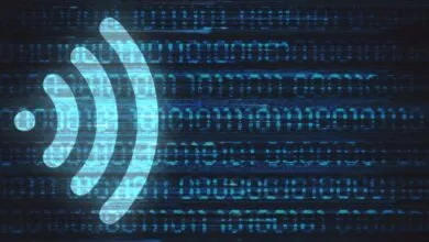 Wireless symbol overlayed on a background of binary code.