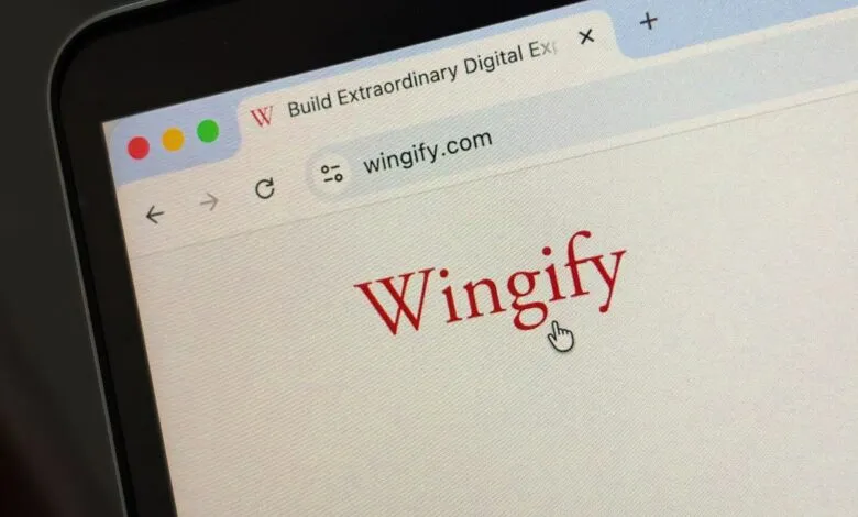 Wingify website displayed on a laptop screen.