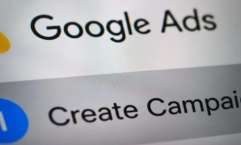 Close-up of a smartphone screen displaying the Google Ads interface.