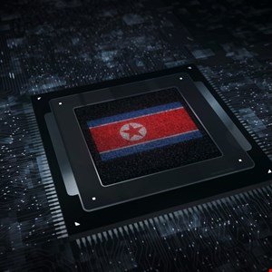 North Korean flag displayed on a computer chip, symbolizing technology.