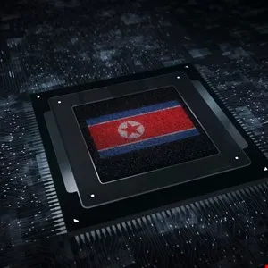 North Korean flag displayed on a computer chip, symbolizing technology.