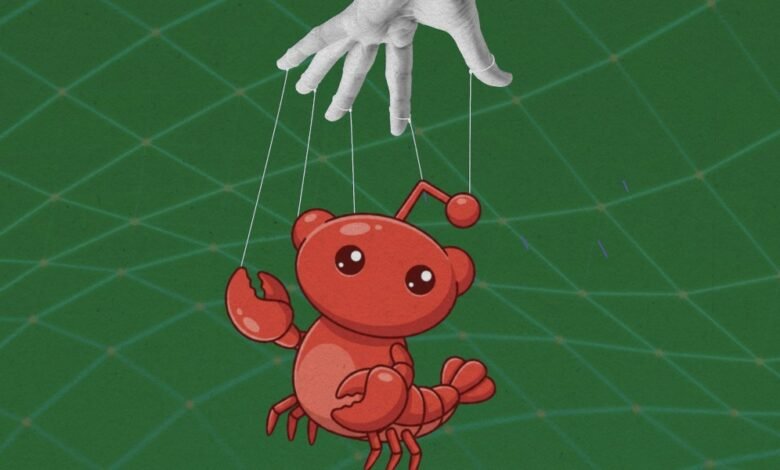 Cartoon red lobster puppet controlled by a hand with strings.