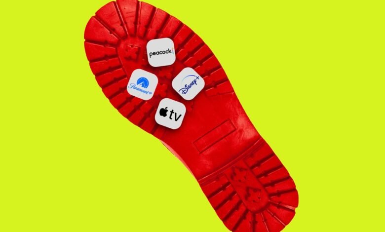 Streaming service logos on the sole of a red boot against a yellow background.