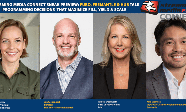 Four professionals smiling at the camera during a Streaming Media Connect event.