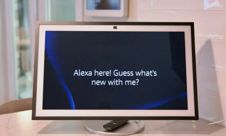 Amazon Echo Show device displaying 'Alexa here! Guess what's new with me?'