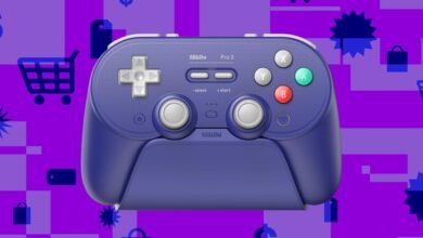 8BitDo Pro 3 controller in purple against a shopping-themed background.
