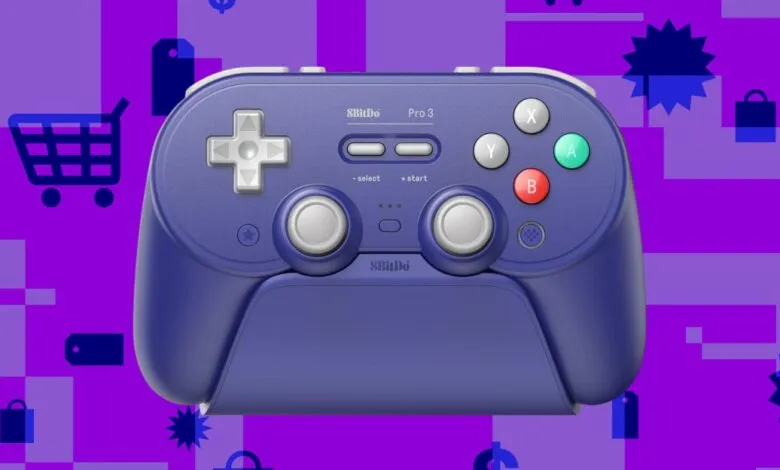 8BitDo Pro 3 controller in purple against a shopping-themed background.