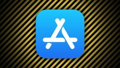 Apple App Store logo on a caution-striped background.