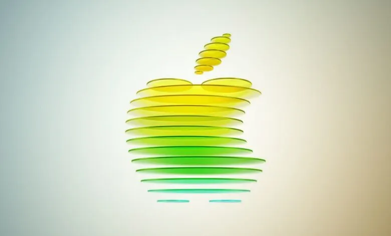 Abstract Apple logo made of layered discs, gradient from yellow to green.