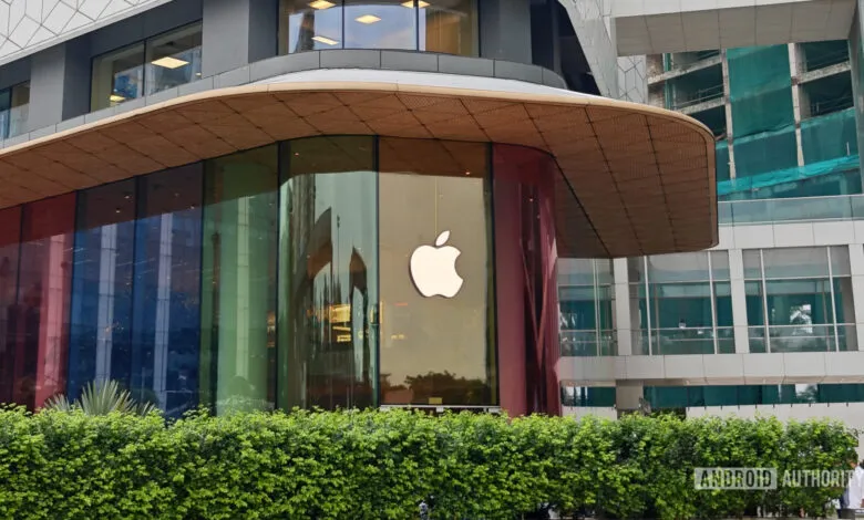 Apple Store exterior with colorful glass panels and Apple logo.