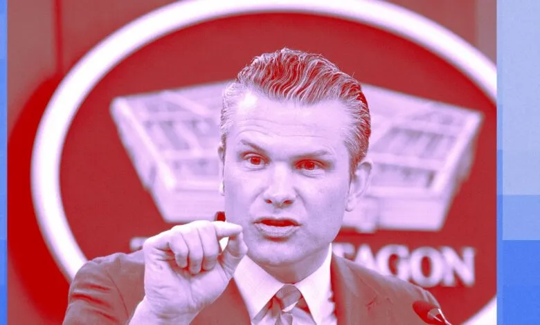 Man speaking with Pentagon logo in background.
