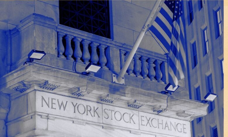 New York Stock Exchange building facade with American flag.