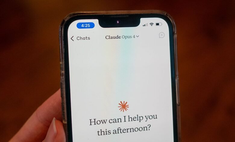 Close-up of a smartphone displaying the Claude Opus 4 AI assistant interface.
