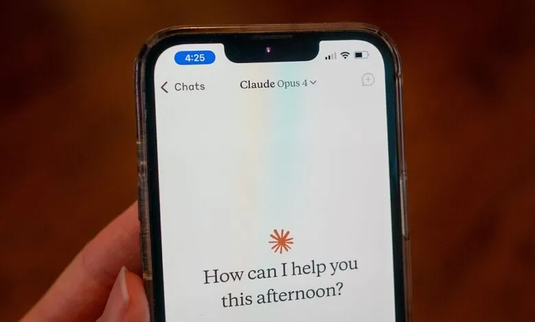 Close-up of a smartphone displaying the Claude Opus 4 AI assistant interface.