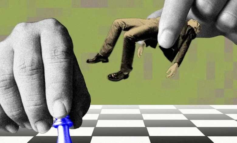 Hand moves human figure like chess piece, symbolizing job displacement.