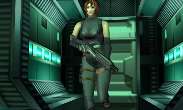 Regina from Dino Crisis stands in a metallic corridor holding a shotgun.