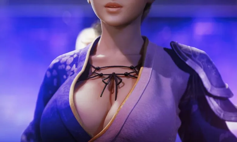 Close-up of a woman's upper body wearing a purple and white outfit with a necklace.