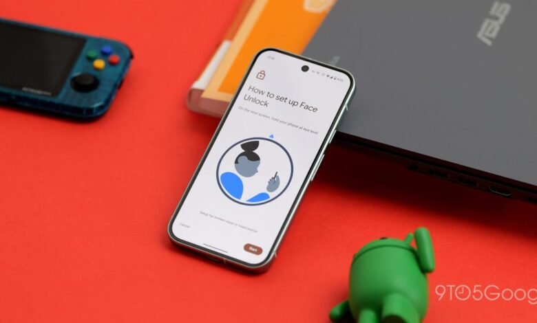 Pixel phone displaying face unlock setup screen on a red surface.