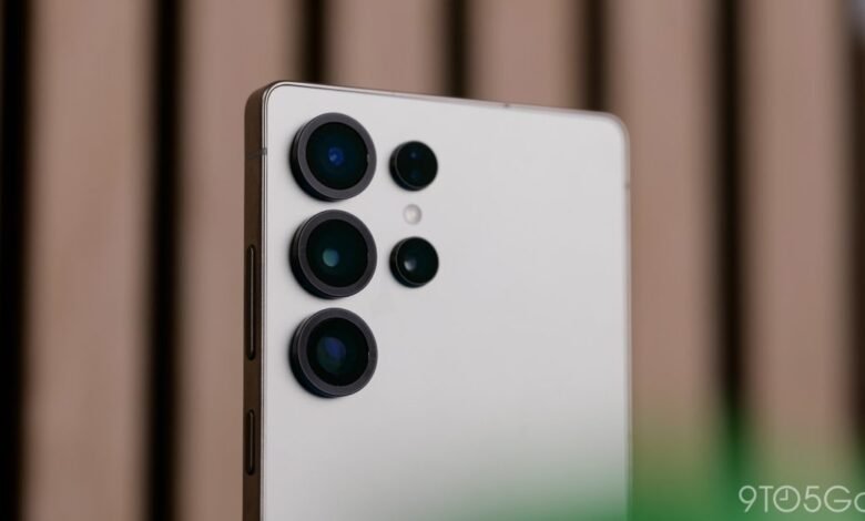 Close-up of a white smartphone showcasing its advanced camera system.