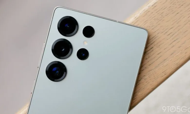 Close-up of a smartphone's rear camera system with multiple lenses.
