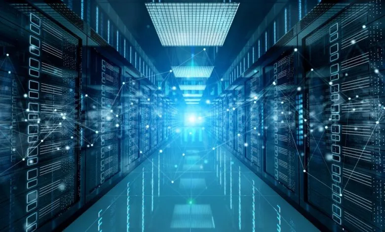 Server room with rows of data storage racks and network connections.