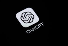 ChatGPT app icon on a smartphone screen, white logo on black background.