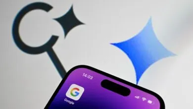 Close-up of iPhone screen showing Google app icon with Google logo in background.