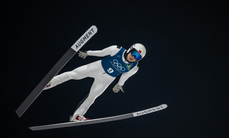 Ski jumper Qiwu Song soars during Milano Cortina 2026 training.