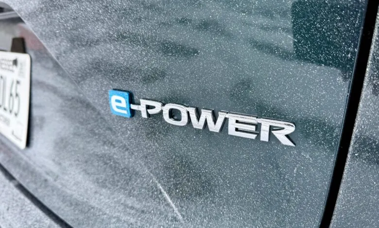 Close-up of a car's rear with an 'e-POWER' emblem and a Tennessee license plate.
