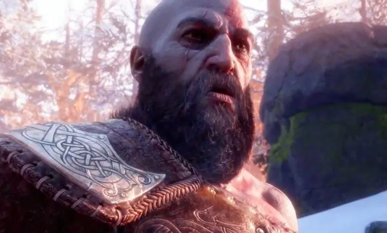Kratos from God of War with a surprised expression in a snowy environment.