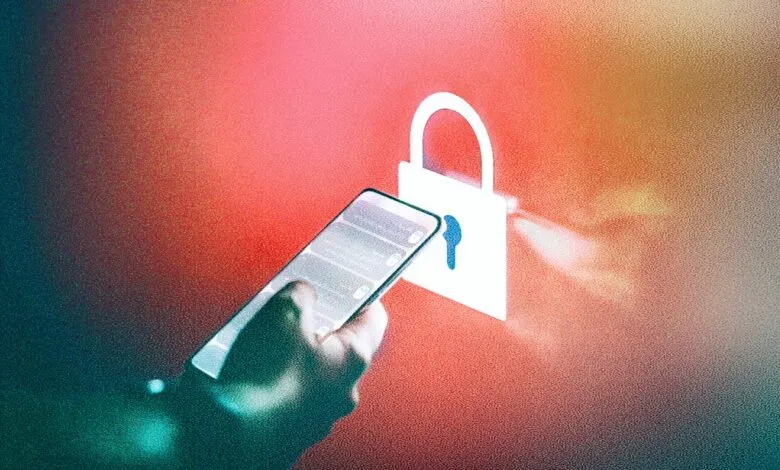 Hand holding smartphone with padlock symbol, representing mobile security.