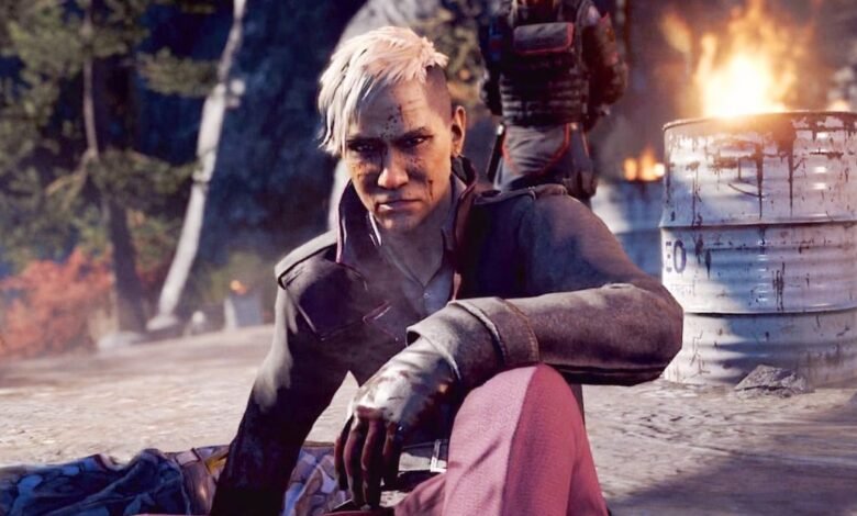 Pagan Min from Far Cry 4 sits with a burning barrel behind him.