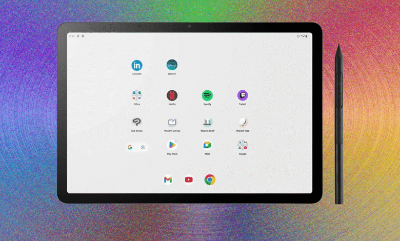 Wacom Movink 13 tablet displaying app icons with stylus on a colorful background.