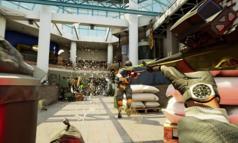 First-person view of intense firefight in a modern shopping mall.