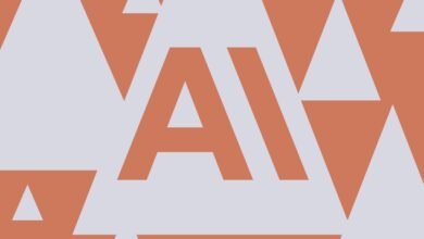 Abstract geometric pattern with triangles and letter 'A' in coral and gray.