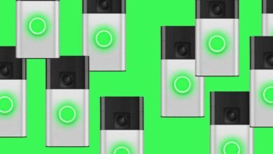 Multiple Ring doorbells displayed against a bright green background.
