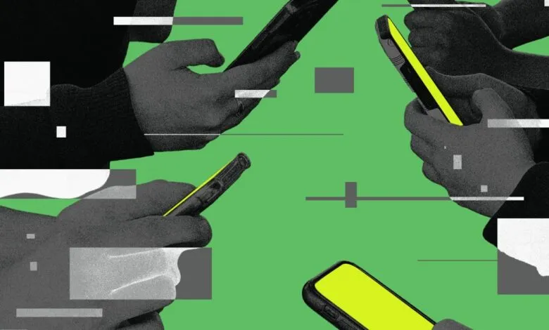 Multiple hands holding phones with bright screens against a green background.