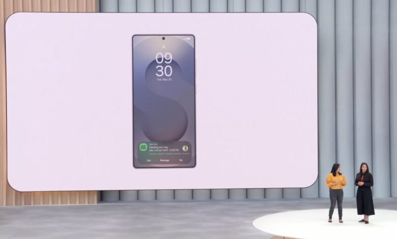 Two women present a new phone with Uber Eats notification on a large screen.