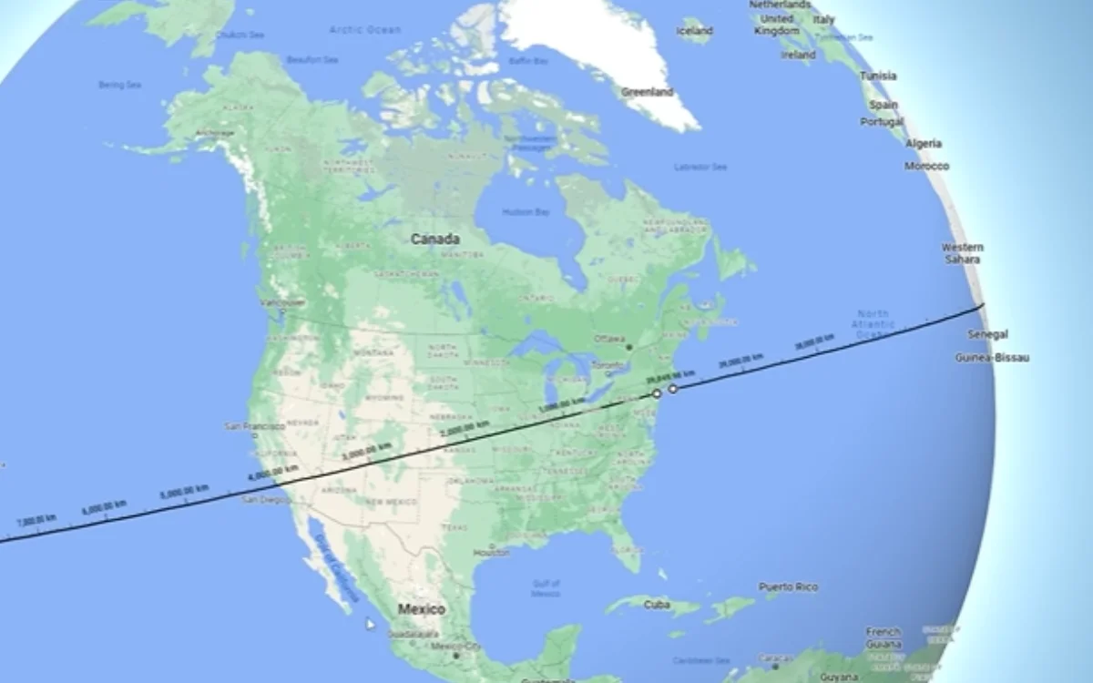 Map showing a line across North America and Africa with distance markers.