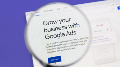 Google Ads webpage magnified, promoting business growth with online advertising.