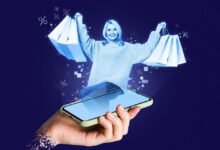 Woman with shopping bags appears from phone screen, digital shopping concept.