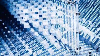 Abstract blue and white geometric structure with lights and cube shapes.