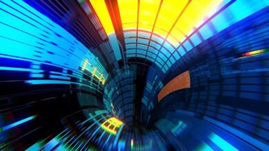 Abstract tunnel with blue, yellow, and orange geometric shapes.