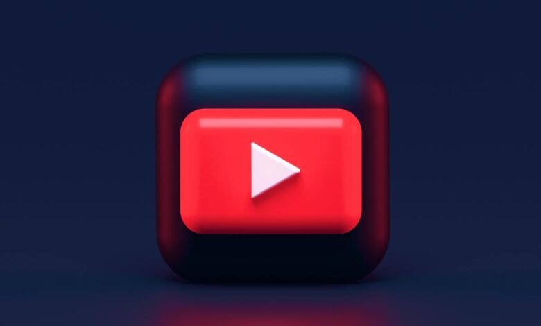 3D rendering of the YouTube play button icon on a dark background.