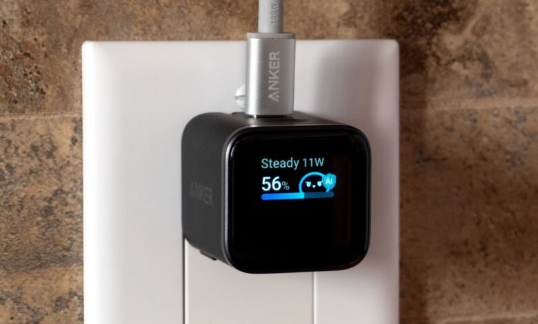 Anker Nano II 65W charger plugged into wall outlet.