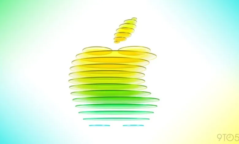 Abstract Apple logo made of stacked, colored discs.