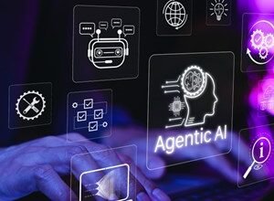 Hands typing on laptop with Agentic AI icons overlayed, representing artificial intelligence.